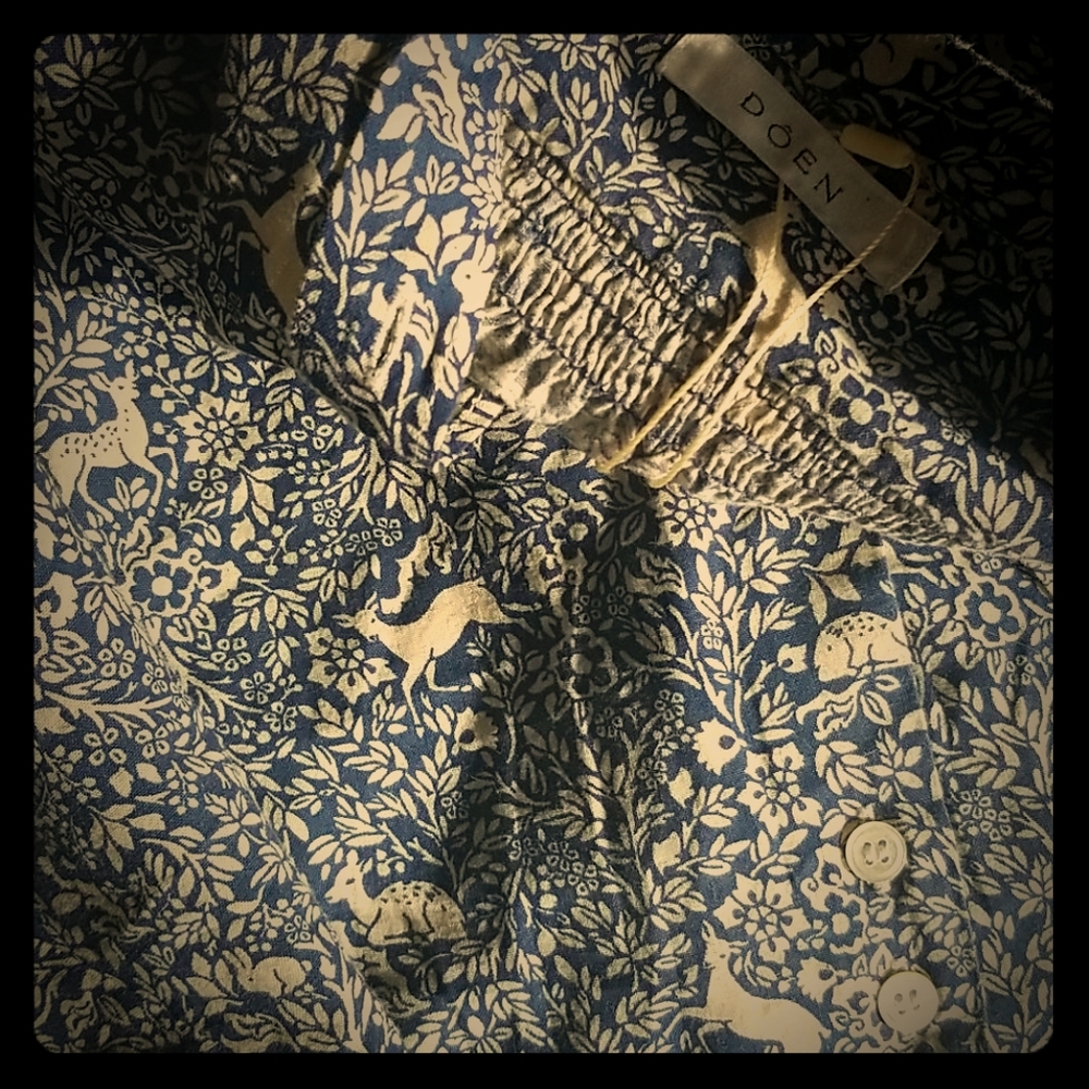 Doen O'Keeffe top like new